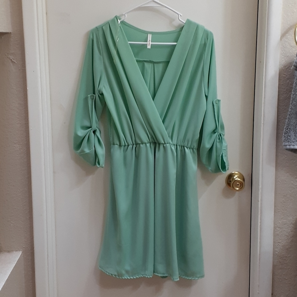 My Story Pastel Mint Green Flowy Pleated V Neck Long Cuffed Button Sleeve Dress